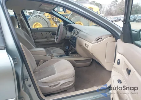 2005 Ford Taurus Se z USA, uszkodzony, nr VIN 1FAFP53U05A311291